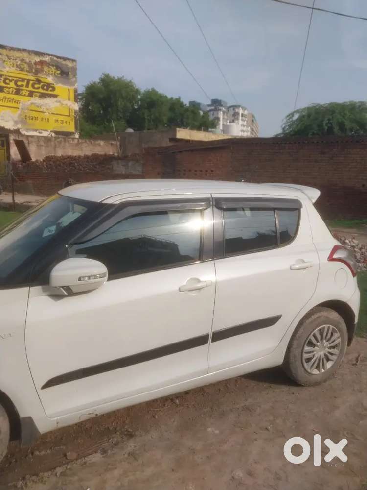 Maruti Suzuki Swift Lxi 2014
