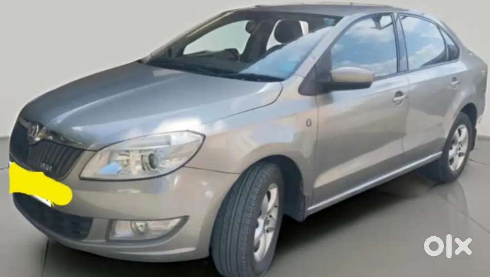 Skoda Rapid Elegance 2013 Petrol