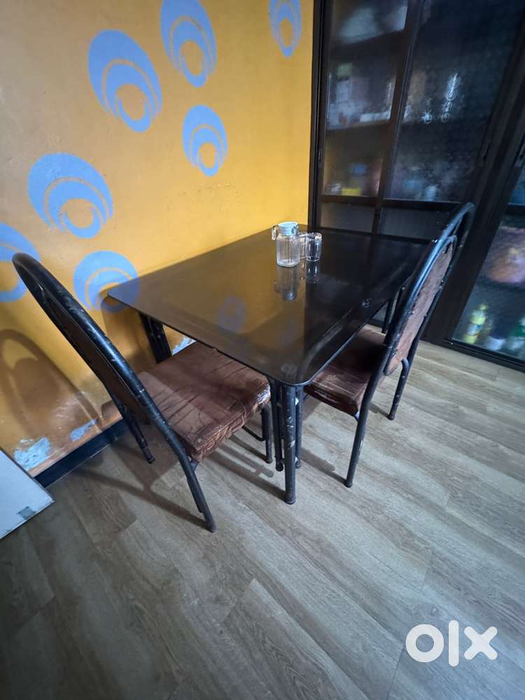 Good condition, black glass, dining
