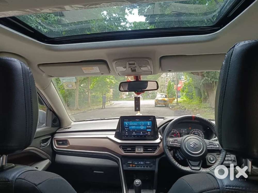Maruti Suzuki Brezza 1.5 Zxi Plus Smart Hybrid Dual Tone, 2023, Petr..