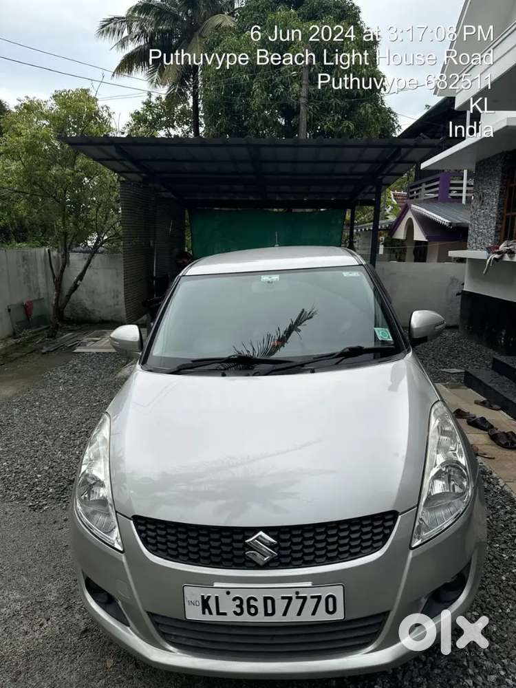 Maruti Suzuki Swift Lxi 2014