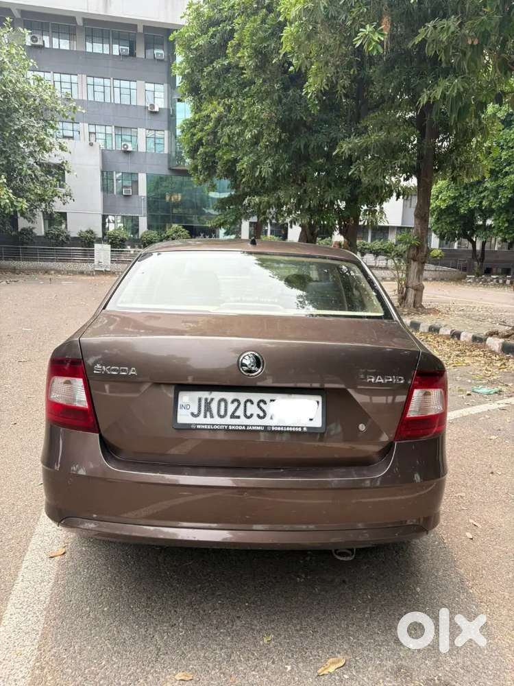 Brown Colour Skoda Rapid Turbro Charge Full Maintained Car