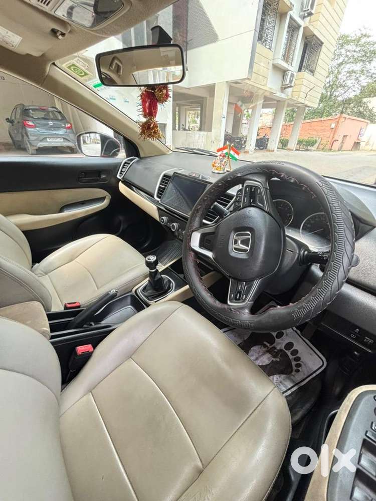 5th Generation Red Colour Honda City V Model Driven By A Ca