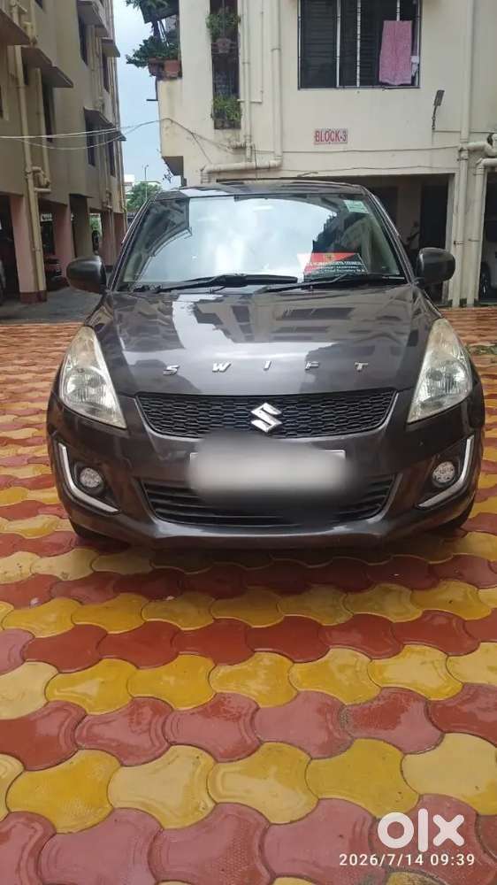 Maruti Suzuki Swift Lxi 2015
