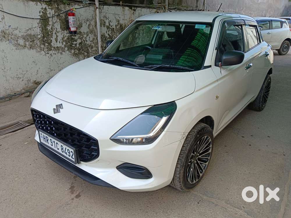 Maruti Suzuki Swift Lxi Optional-o, 2024, Petrol