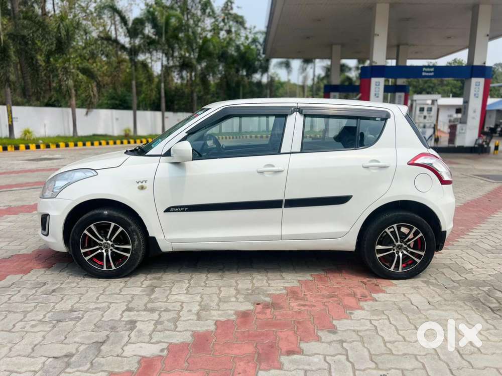 Maruti Suzuki Swift Lxi Optional-o, 2015, Petrol