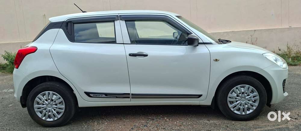 Maruti Suzuki Swift Lxi Optional-o, 2019, Petrol