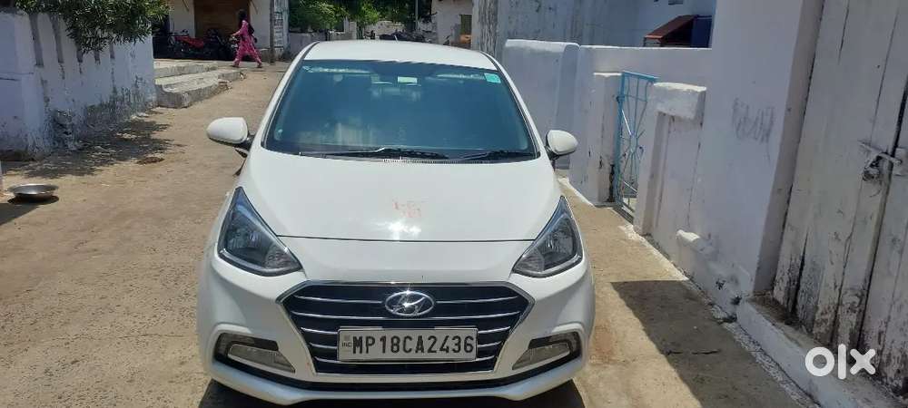 Hyundai Xcent Cng + Petrol  40,000 Km  32 Km/kg Mileage  Excellent