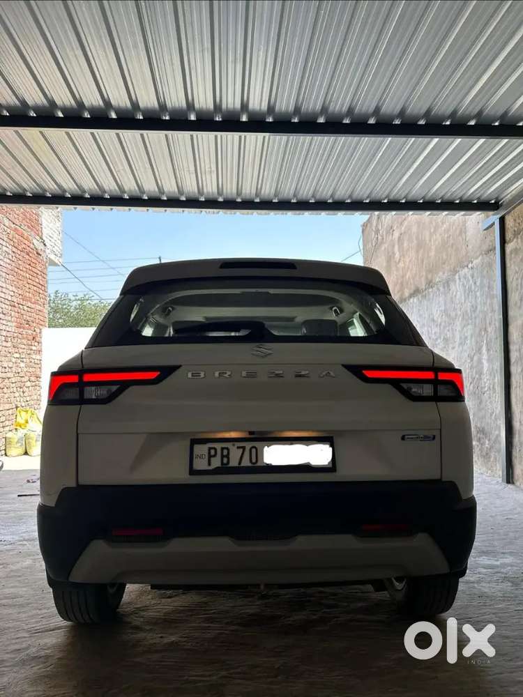 2022 Breeza Zxi Smart Hybrid