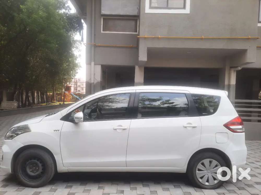 White Ertiga, Brand New Spare Tire, Only 1 Year Old Battery.