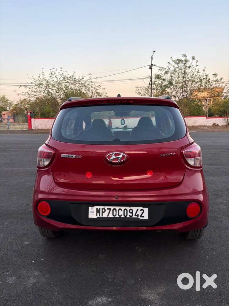 2018 Hyundai Grand I10 Red   First Owner  56,399 Km  ₹3,60,000