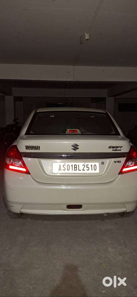 Swift Dzire Vxi, White Color, Bought May 16, 2014