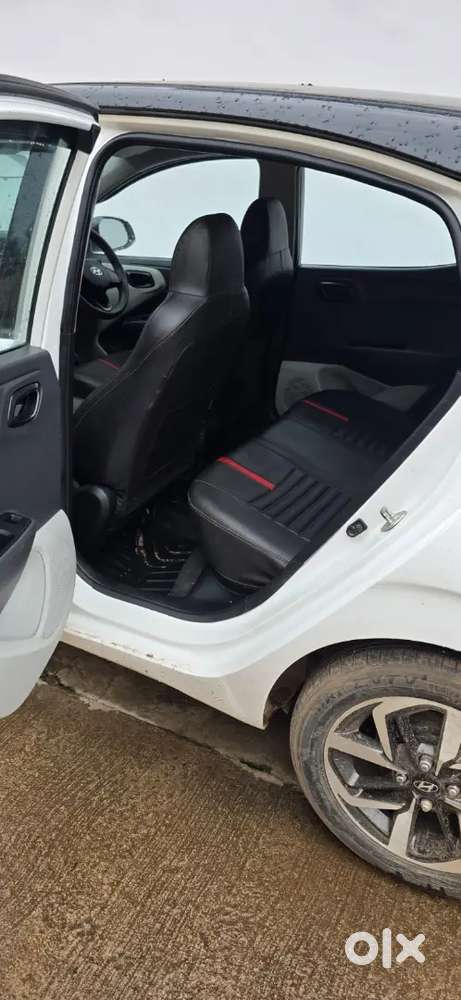 Hyundai Grand I10 Nios 
Sports Variant
Colour White/black
Cg 04 Passin