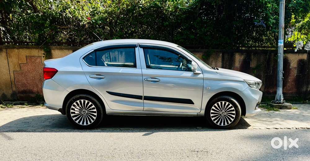 Honda Amaze Petrol/cng  2019  64000 K.m Driven  Hr 87 Reg.