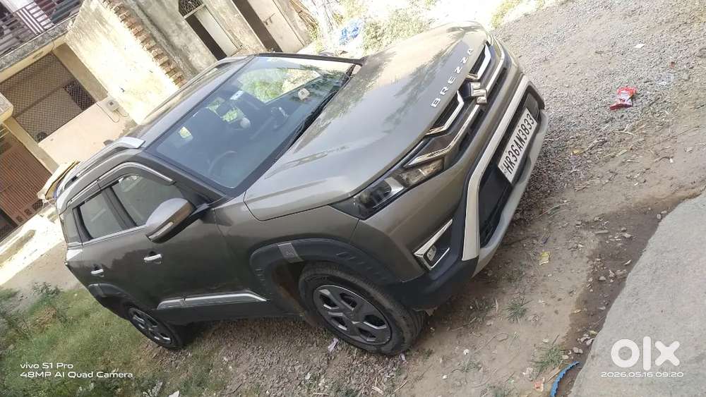 Maruti Suzuki New Brezza 2023. My Car Insurance Feb. 2027.