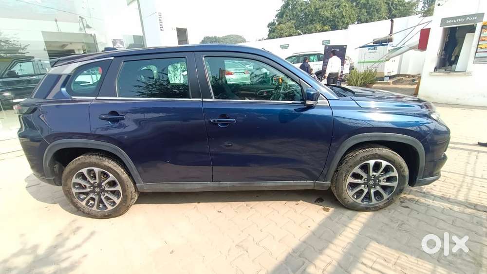 Maruti Suzuki Grand Vitara 1.5 Zeta Plus Dual Tone Intelligent Hybri..