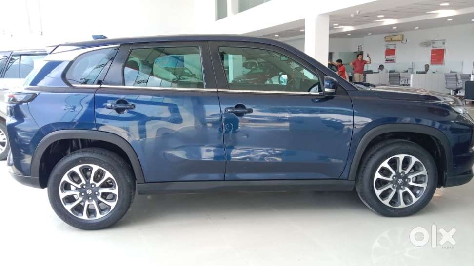 Maruti Suzuki Grand Vitara 1.5 Zeta Plus Dual Tone Intelligent Hybri..