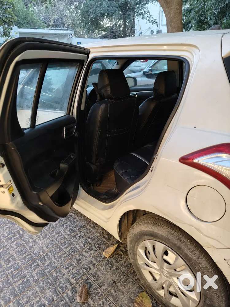 Swift Lxi 2027 White Color Good Condition.