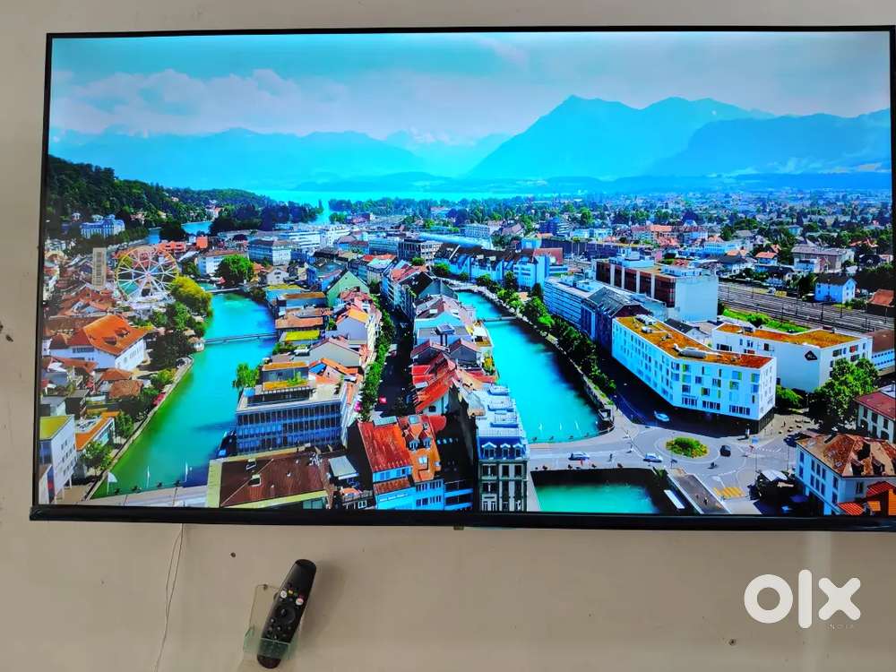 LG Webos 4K QLED tv with magic mouse remote