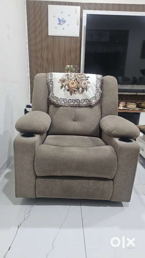 Three seater Sofa one Recknilet