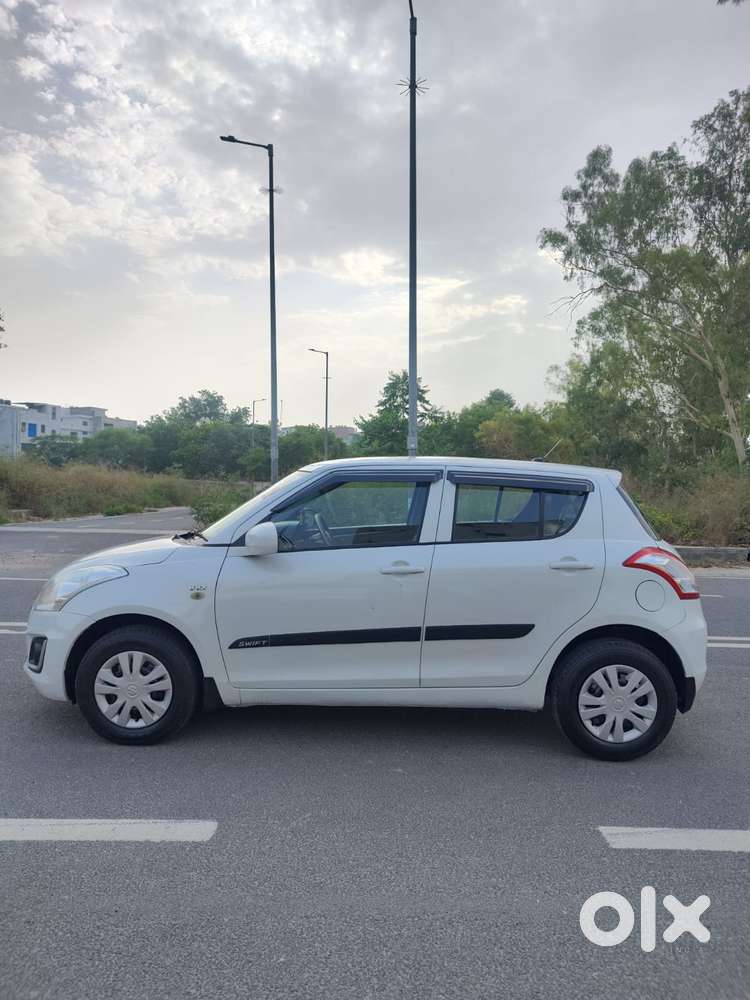 Maruti Suzuki Swift Lxi Optional-o, 2017, Petrol
