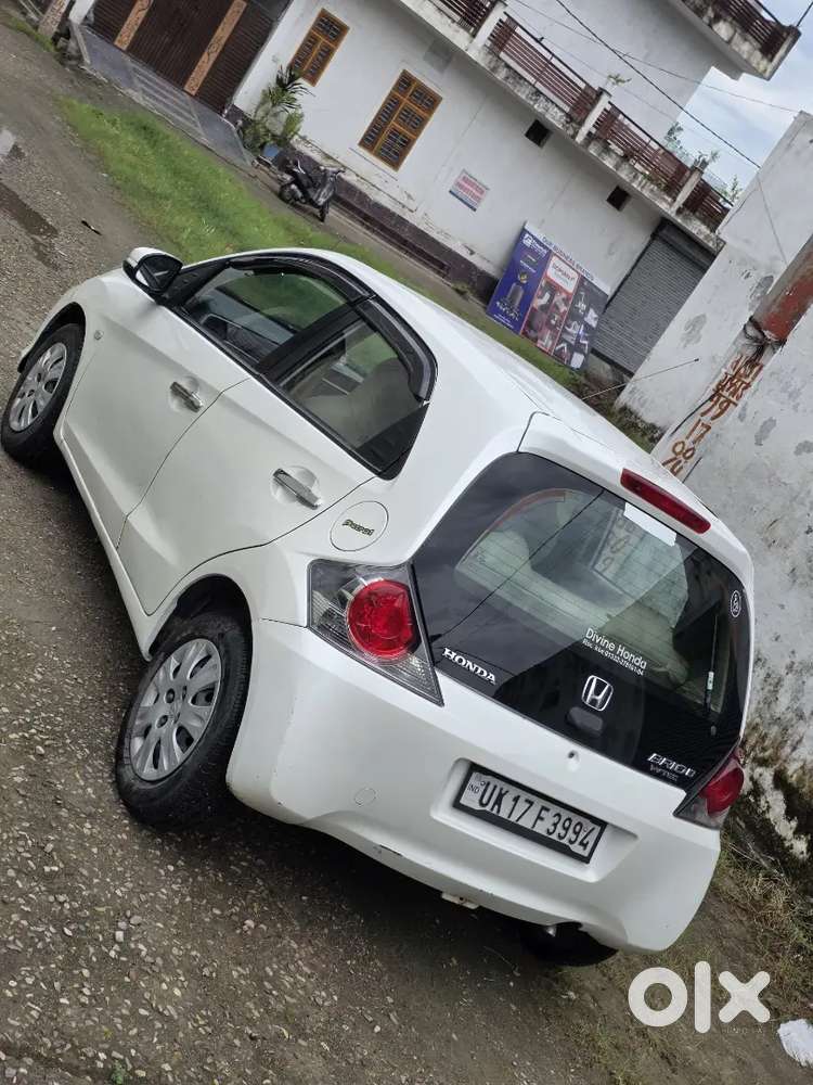 Honda Brio Smt
1st Owner 
Central Locking