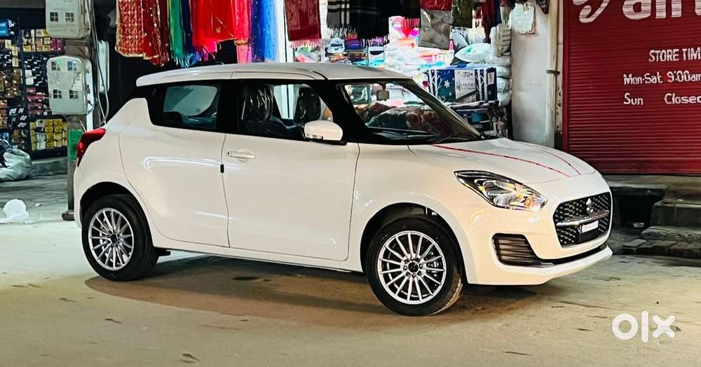  Maruti Suzuki Swift Vxi 2022  Pearl White  First Owner