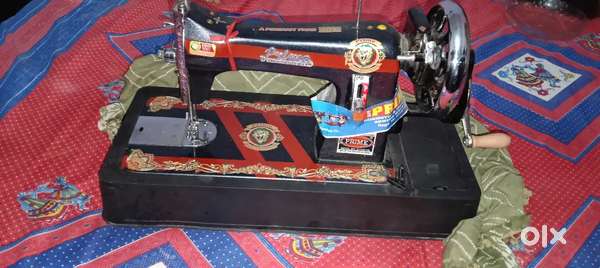 Silai machine prime with foot wear and wooden bord