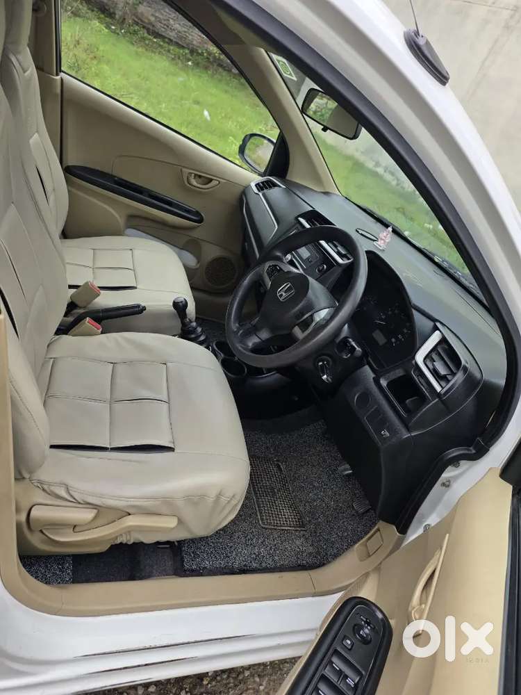 Honda Brio Smt
1st Owner 
Central Locking