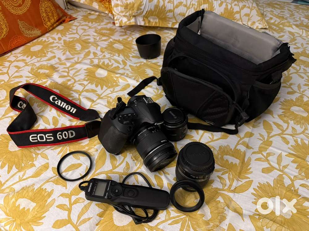 Canon 60 d with 50 mm prime, 10-18 , freebies and bag