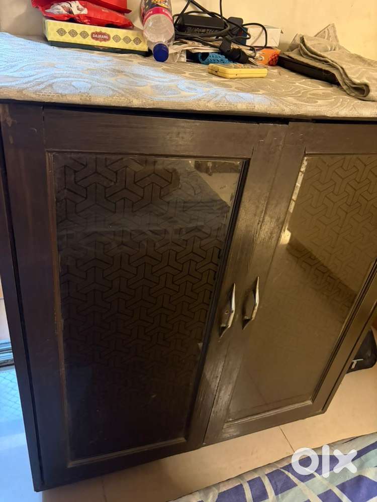 Classy and delicate brown wooden shelf( Almirah)