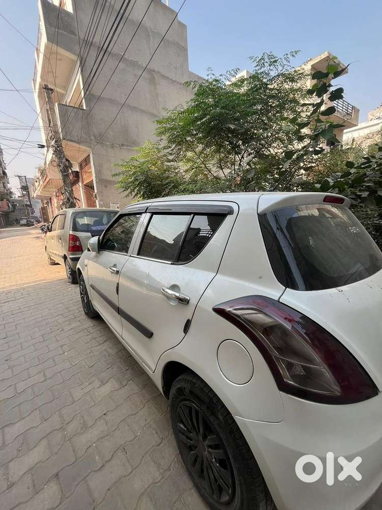 Maruti Suzuki Swift Lxi 2015
