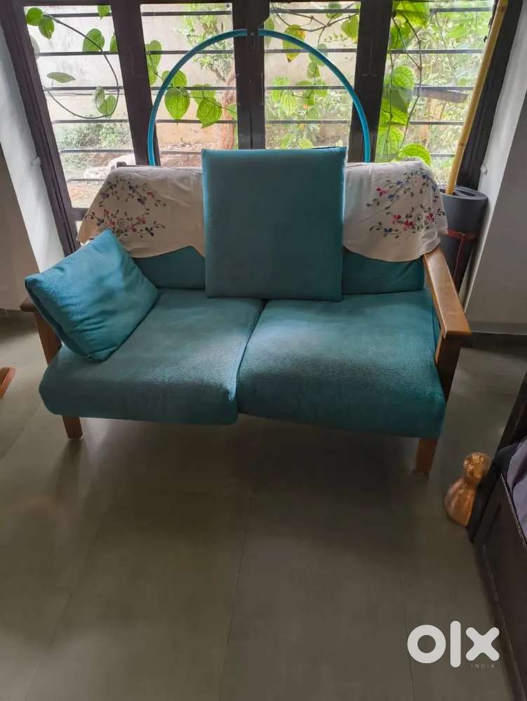 Wooden sofa two seater in good condition