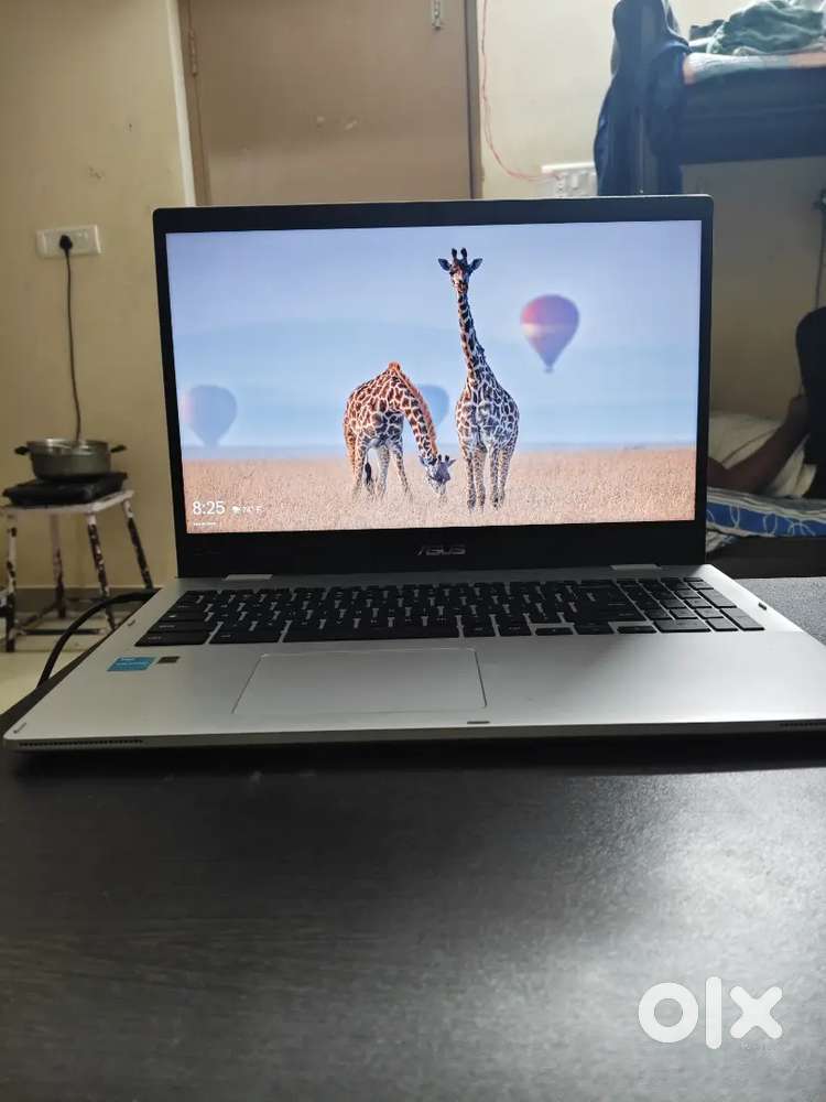 I am selling brand new condition Asus chromebook