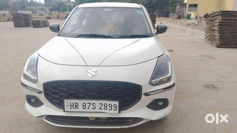 Maruti Suzuki Swift 1.2 Lxi (o), 2024, Petrol
