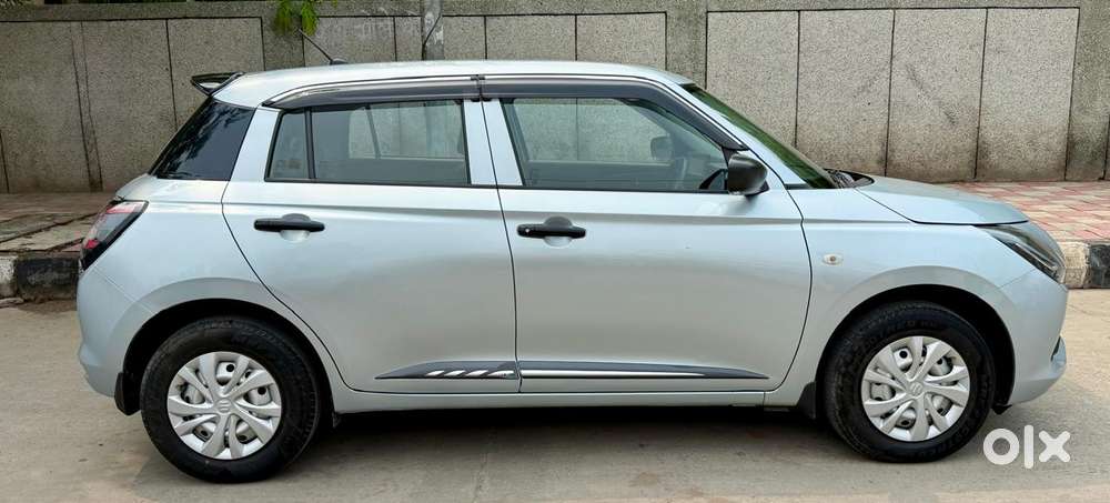 Maruti Suzuki Swift Lxi Optional-o, 2024, Petrol