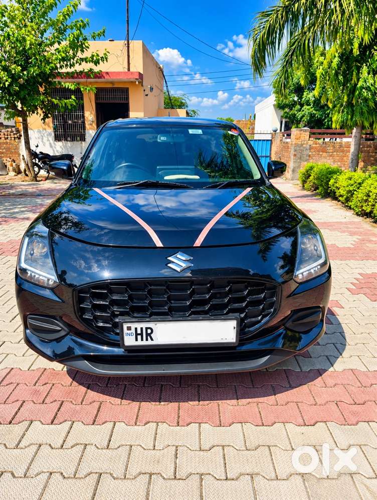 Maruti Suzuki Swift Vxi 2026