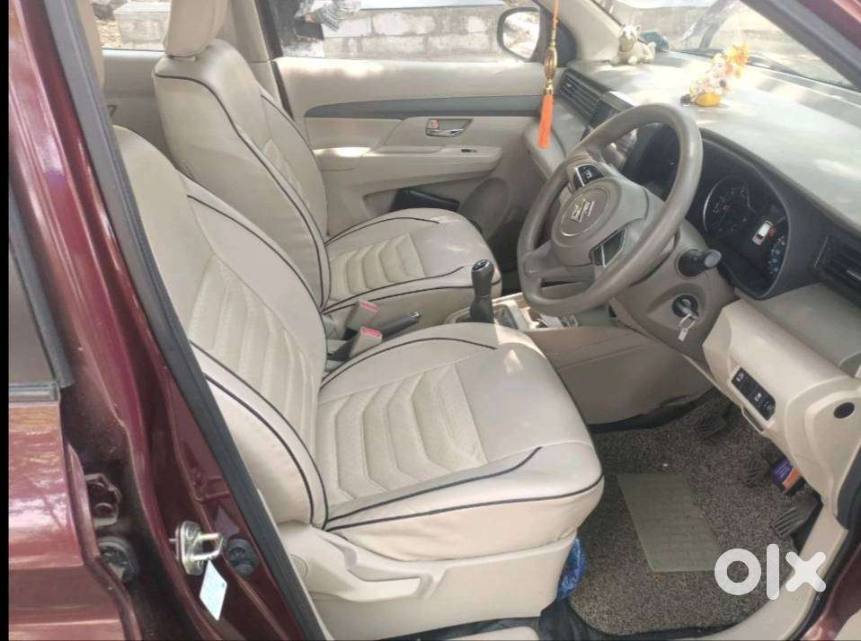 Ertiga Smart Hybrid Vxi (o) , Colour -prme. Auburn Red