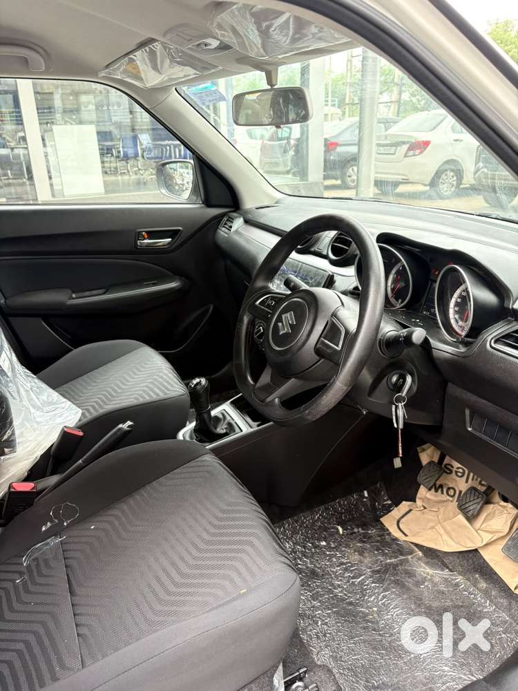 Maruti Suzuki Swift 1.2 Vxi (o), 2024, Petrol
