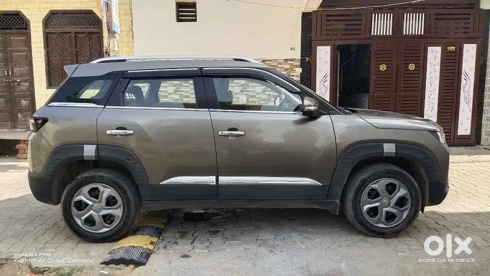 Maruti Suzuki New Brezza 2023. My Car Insurance Feb. 2027.