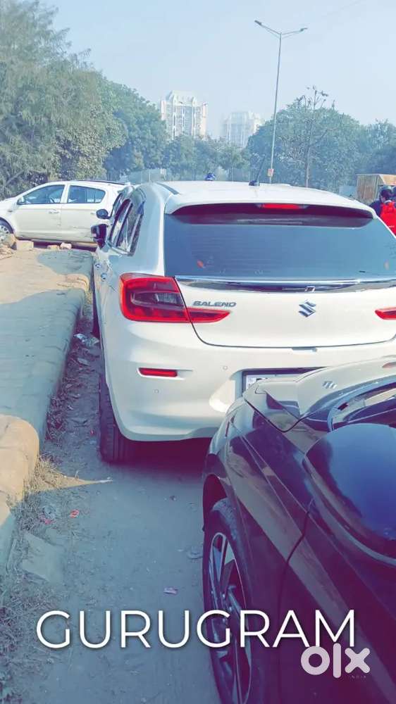 Baleno 2023 Petrol 1st Owner White Alloy Wheels Led Light Music System
