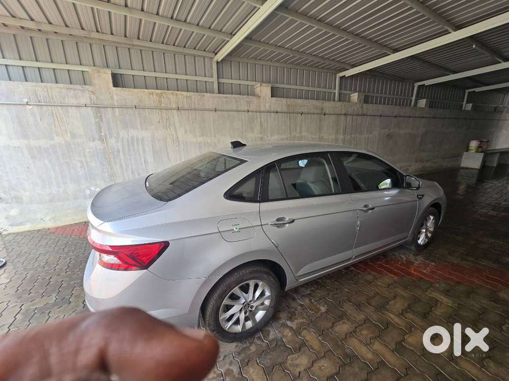 Slavia- Silver-10600 Kmtr New Car