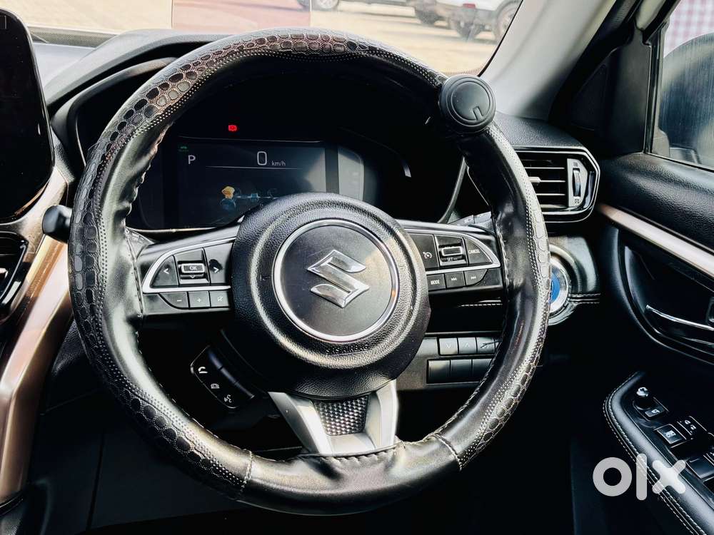 Maruti Suzuki Grand Vitara 1.5 Zeta Plus Dual Tone Intelligent Hybri..