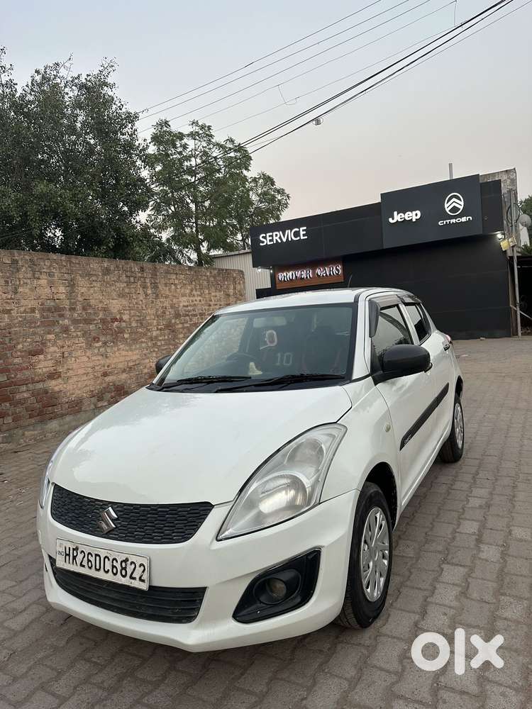 Maruti Suzuki Swift Lxi Optional-o, 2017, Petrol