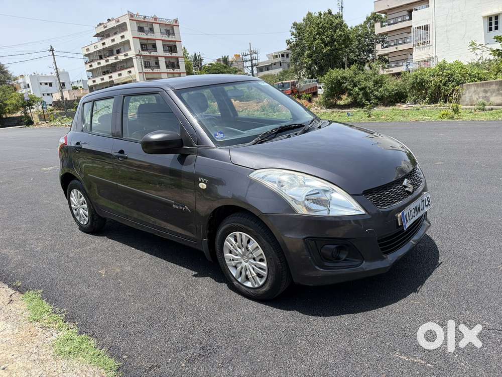 Maruti Suzuki Swift Lxi Optional-o, 2015, Petrol