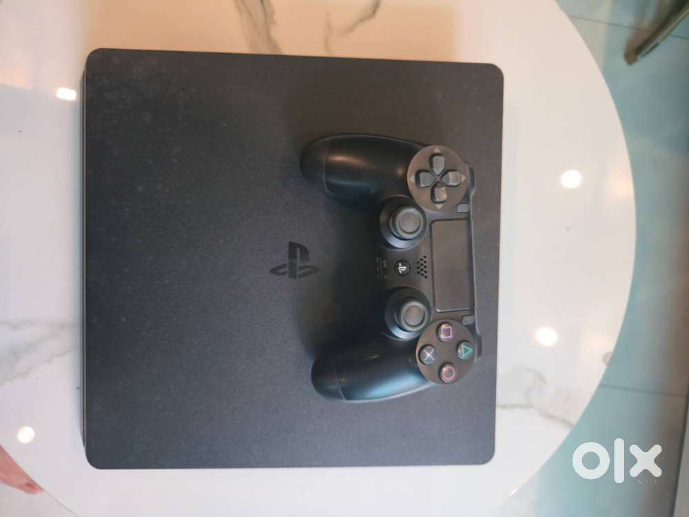 Sony PS4 Slim 1TB  5 Original Games + GTA 5 Deluxe  Genuine Accessor