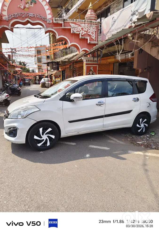 Ertiga Vxi Year 2015 April White Colour Petrol In Excellent Condition.
