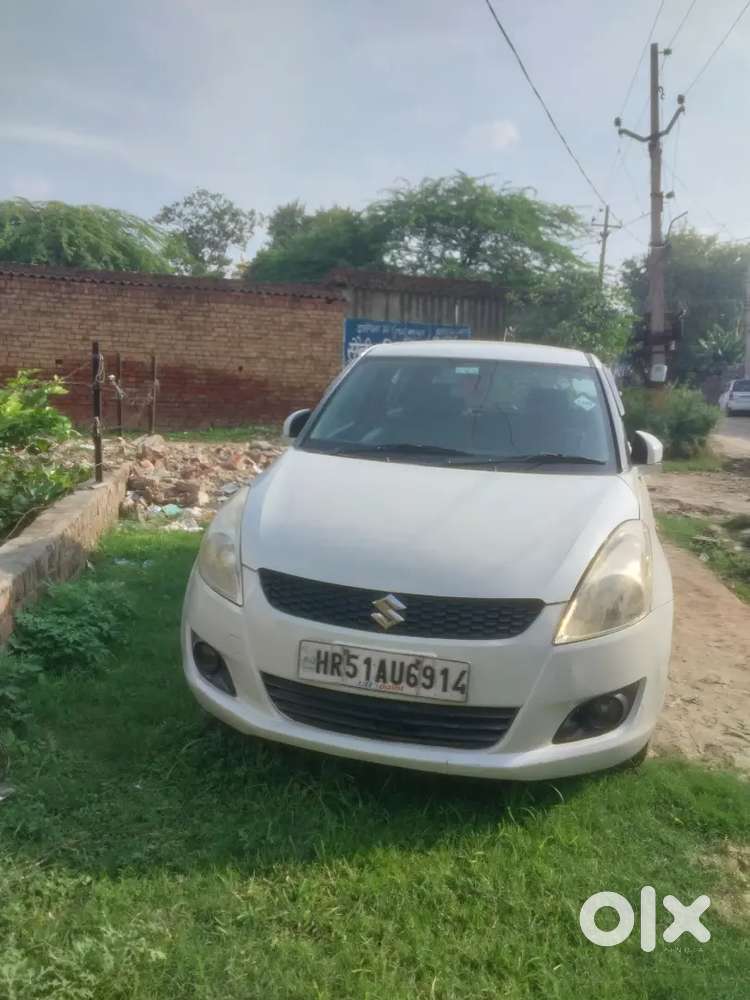 Maruti Suzuki Swift Lxi 2014