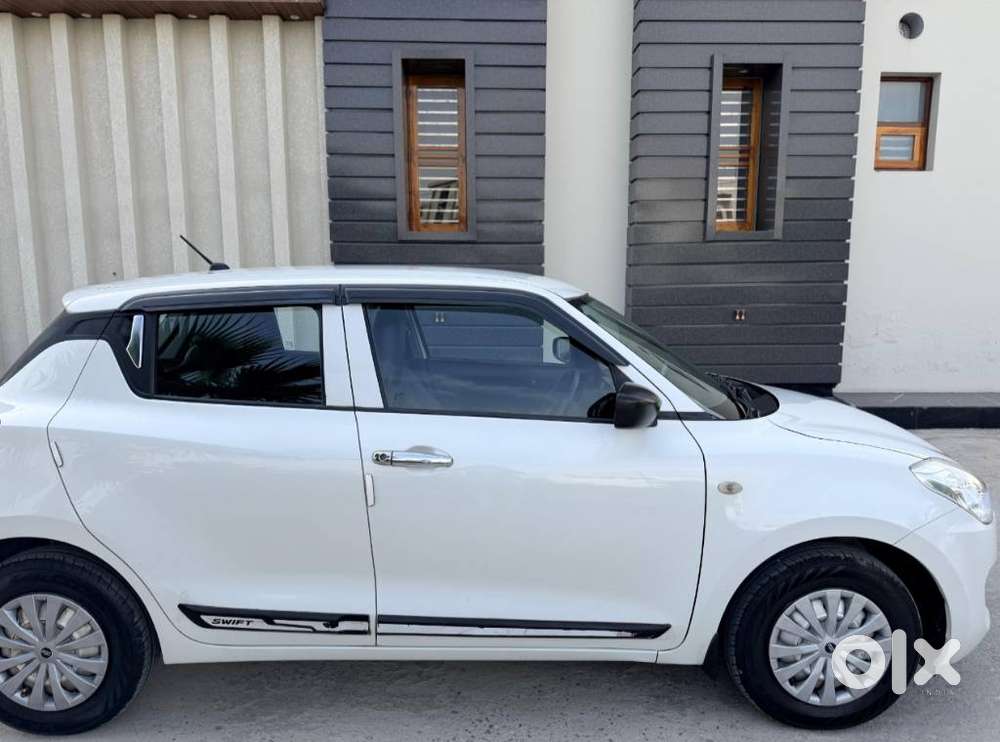 Maruti Suzuki Swift Lxi Optional-o, 2019, Petrol