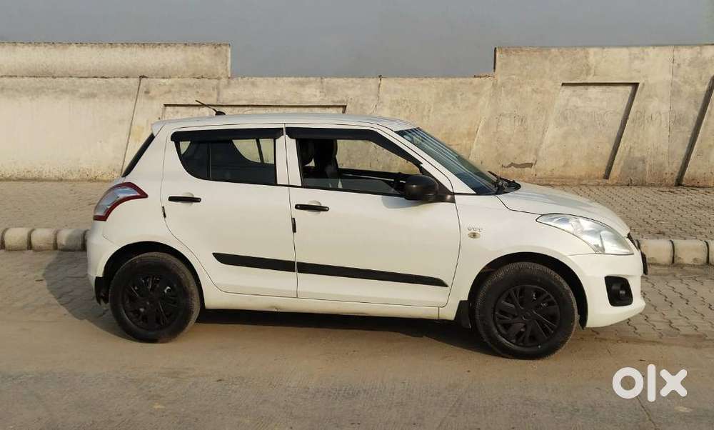 Maruti Suzuki Swift Lxi Optional-o, 2017, Petrol
